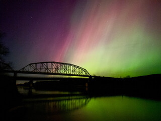 Northern Lights Aurora Borealis over Iron Bridge in Montana 