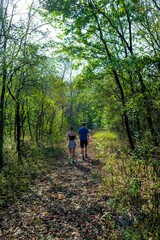 Obraz premium Young People On Hiking Trail Through Danube Wetlands National Park In Austria