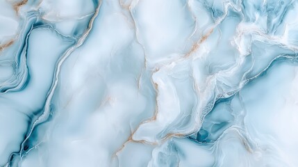 A blue and gold marble wall with a blue and gold swirl pattern. The marble is smooth and shiny, giving the wall a luxurious and elegant appearance. The blue and gold colors create a sense of warmth