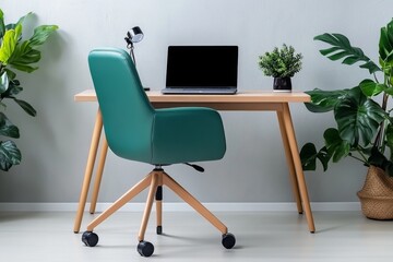 A home office with a minimalist desk, ergonomic chair, and a laptop, surrounded by plants for a calming workspace