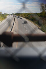 Highway bridge views of cars and seat with positive words