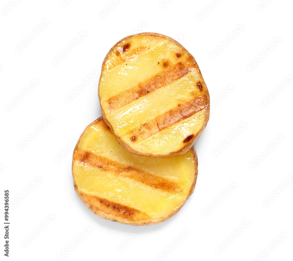 Wall mural Pieces of delicious grilled potato on white background