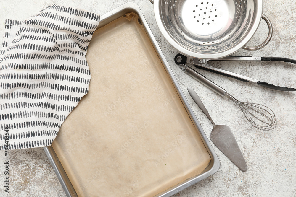 Canvas Prints Composition with empty baking tray and kitchen utensils on light background