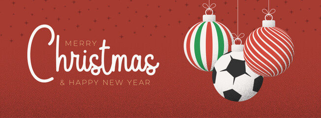 soccer football Christmas Greeting grainy card. Merry Christmas and happy new year sport retro greeting card. Hang on a thread xmas ball bauble