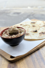 libanese pita bread and moutabal dish