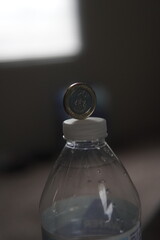 Jamaican and Canadian coins in a small safe