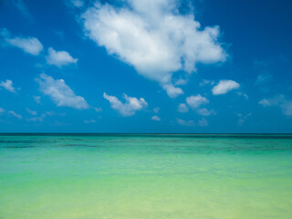 Horizon beautiful landscape summer season panorama front view tropical sea beach white sand clean blue sky cloud background calm nature ocean wave water travel holiday relax at island sun day time