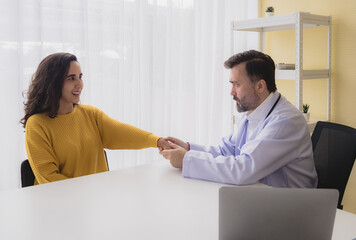 Latin woman sick mentally sit chair with man doctor caucasian sitting two people talk check health...