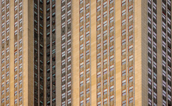 Grid-like facade of a skyscraper with windows in New York City