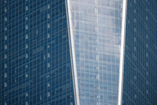 Close-up view of modern glass skyscraper facade in New York City