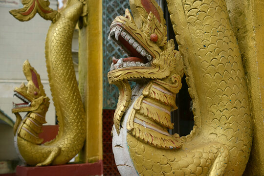 Serpentine guardians at temple in Myanmar