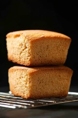 A wooden table background is adorned with a variety of baked breads