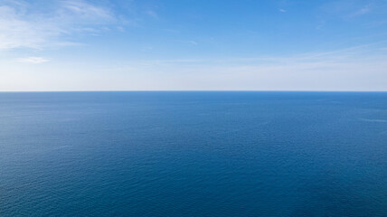 Aerial View of Calm Blue Ocean and Clear Sky Horizon