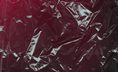 A Shiny Black Plastic Texture beautifully adorned with Striking Red Highlights for visual impact