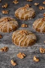 Homemade cookies with walnuts on a gray background