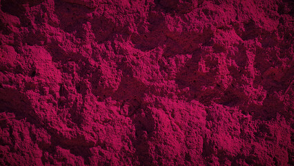 Deep magenta stone texture with rugged patterns, ideal for bold and vibrant backgrounds, wallpapers, and modern design elements