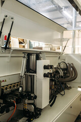 Industrial Furniture Manufacturing Machine With Pneumatic Fittings and a Lifting Lid