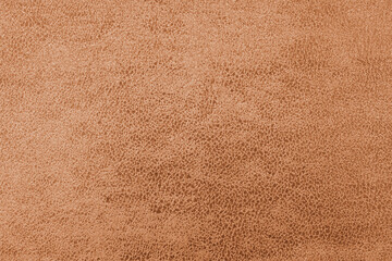 Cloth structure of jacquard orange fabric with abstract shabby texture background closeup, macro