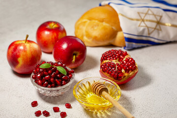 Rosh Hashanah is a Jew New Year. Apple, honey, pomegranate for the festive table. Happy Rosh Hashanah. Shana Tova