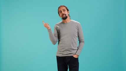 Cheerful man acting casually, exuding nonchalant and carefree demeanor. Portrait of jolly person...