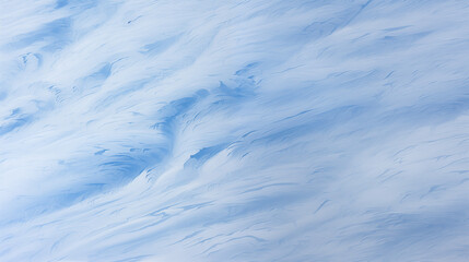 Obraz premium Abstract background imitating snow texture with soft blue tones and flowing patterns