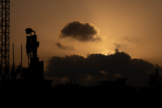 Cloody sunset in the construction city