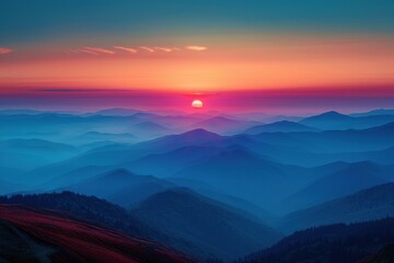 Fototapeta premium Mountains are covered in a colorful sunset with a red sun, travel concept, copy space