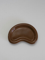 Single Brown Ceramic Plate With Abstract Kidney Shape