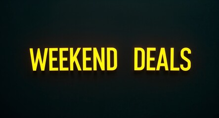 Fototapeta premium Weekend deals word lettering with yellow glow on plain black dark background
