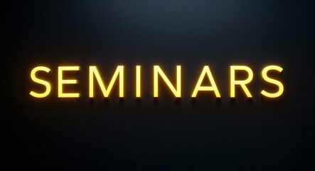 Fototapeta premium seminars word lettering with yellow glow on plain black dark background
