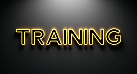 Fototapeta premium training word lettering with yellow glow on plain black dark background