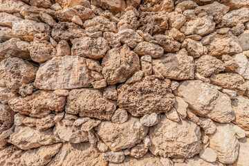 Coral stone wall in Al Qassar heritage village on Farasan island, Saudi Arabia