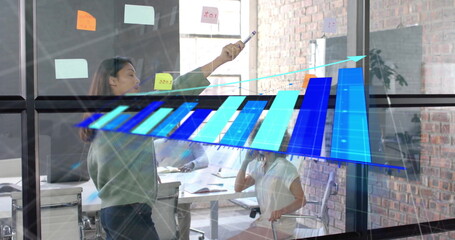 Image of data processing and diagrams over diverse business people discussing work in office