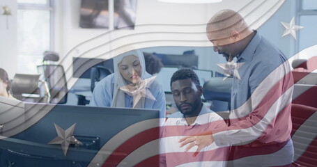 Image of flag of usa over diverse business people in office