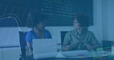 Image of financial data processing over diverse colleagues discussing work in office