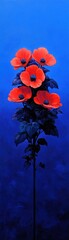 Vibrant red flowers against a deep blue background, isolated for artistic effect.