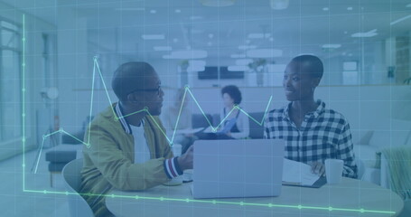 Image of financial data processing over diverse colleagues discussing work in office