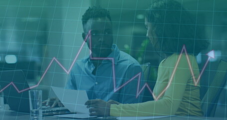 Image of financial data processing over diverse colleagues discussing work in office