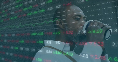 Image of financial data processing over african american man using smartphone in city