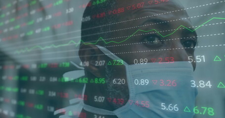 Image of financial data processing over african american man in face mask in city