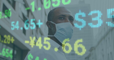 Image of financial data processing over african american man in face mask in city
