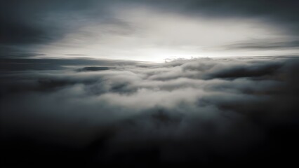 Fototapeta premium Foggy morning sky with low drifting clouds and soft light