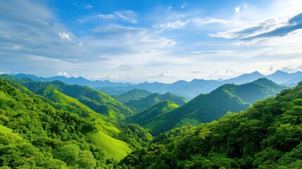 Breathtaking view of lush green mountains under a bright blue sky.