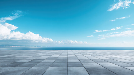 An empty square SLATE pavement with a blue sky as the background