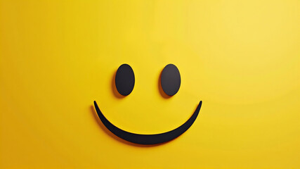 A cheerful yellow smiley face against a yellow background. World Smile day, Emoji Day and Laughter Day. World Smile day concept