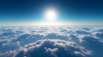 Naklejka premium A serene view above the clouds, with a deep blue sky and a small bright sun