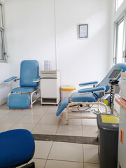Blood donor chair in medical laboratory in hospital. Equipment for blood transfusion in blood transfusion unit. interior of medical room