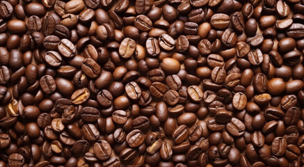 Fototapeta premium Roasted Coffee beans grains background,A heap of coffee beans, ready to be brewed into delicious cup of coffee