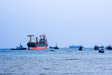 Obraz premium oil transport ship at the port industry in export logistics and international shipping by containers