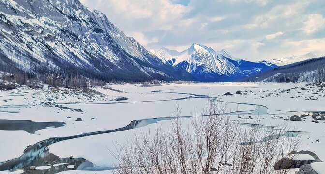 Medicine Lake, snow covered mountains in Jasper National Park